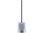 Brosse de toilette moderne avec manche en acier inoxydable et support translucide.