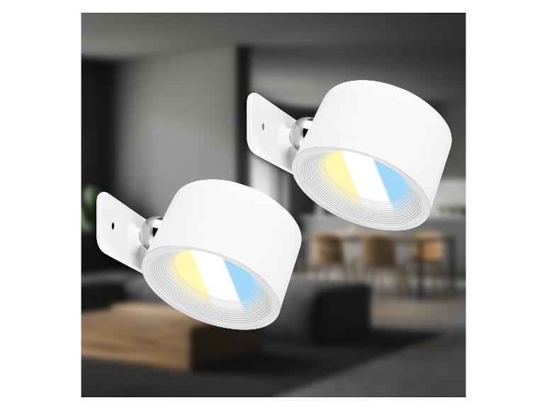 Deux spots LED blancs réglables avec réglages de lumière chaude et froide dans une pièce moderne.
