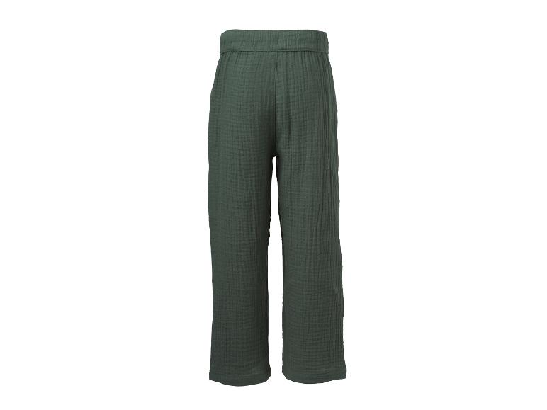 Pantalon large vert foncé en tissu texturé et froissé.