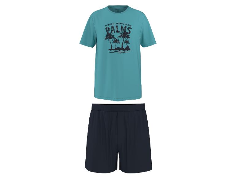 T-shirt sarcelle avec imprimé palmier et short bleu foncé.