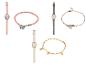 Trois montres avec des bracelets en cuir et deux bracelets.