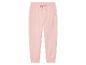Un pantalon de survêtement rose pour filles.