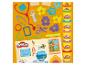 Jouets en pâte à modeler avec outils de vétérinaire et pots de pâte à modeler.