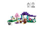 Un set LEGO Minecraft avec une maison, un champignon rose et un loup.