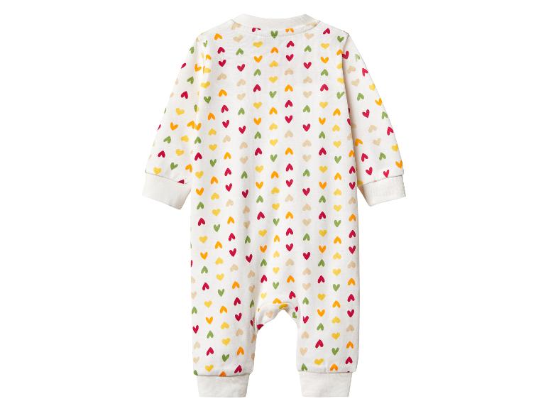 Grenouillère blanche pour bébé avec motif de cœurs colorés