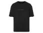 Un t-shirt noir avec le logo New Harbour.