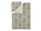 Parure de lit et taie d'oreiller à motif floral gris et beige.