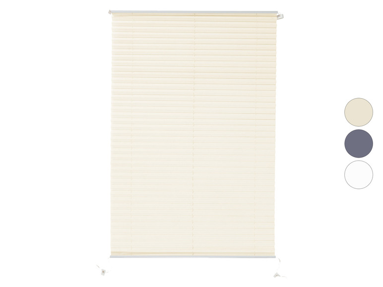 Store plissée beige avec échantillons de couleur blanc et gris.