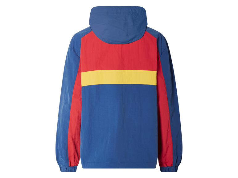 Une veste de survêtement bleue avec des accents rouges et jaunes.