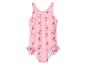 Maillot de bain rose pour fille avec imprimé cerises et volants.
