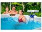 Piscine hors-sol avec cascade : détente estivale en famille.