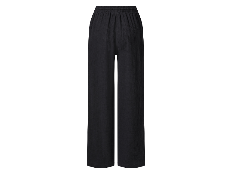 Pantalon ample noir en tissu léger avec taille élastique.