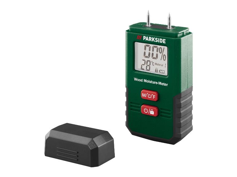 Un hygromètre à bois Parkside vert avec une batterie noire.