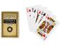 Une boîte de cartes Ezama Magic Tapered & Mind Reading et quelques cartes avec des cœurs, des trèfles, des diamants et des piques.