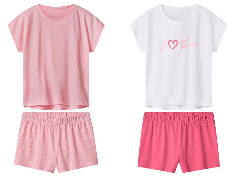 Deux ensembles de pyjama: un rose à pois et un blanc et rose avec 'I love Sleep'.