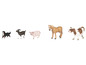 Un cheval, une vache, une chèvre, un cochon et un chien, tous des jouets animaux.