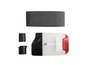 Une ponceuse Parkside avec bande abrasive et accessoires.