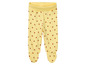 Leggings de bébé jaunes avec un motif de fraises.