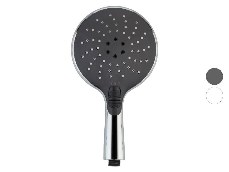 Pommeau de douche à main chromé avec surface de pulvérisation noire, doté d'un sélecteur de mode.