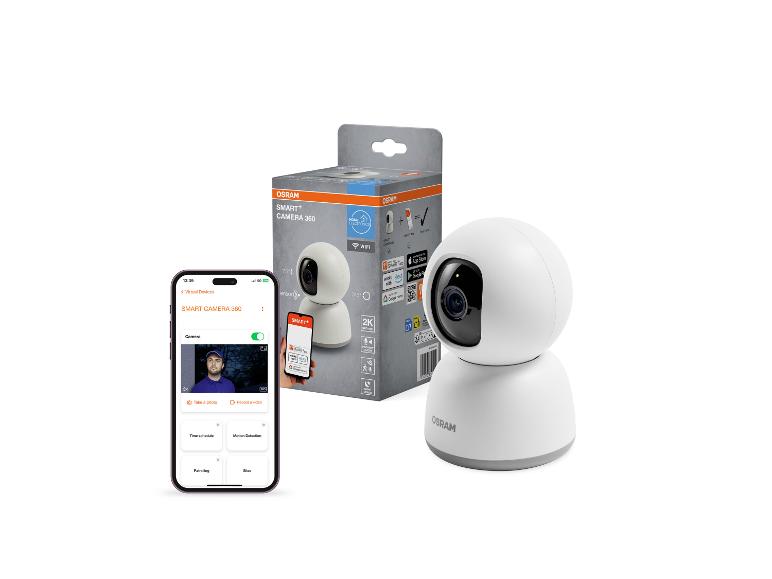 Caméra intelligente à 360 degrés et son emballage, avec un téléphone affichant l'application.