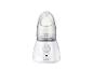 Un vaporisateur facial Silvercrest blanc avec une tête de vapeur transparente.