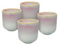 Quatre tasses en céramique roses et blanches.