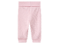 Pantalon bébé rose côtelé.