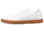 Baskets blanches en cuir avec semelle en caoutchouc.