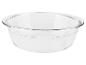 Un bol en verre transparent, idéal pour cuisiner ou servir des aliments.