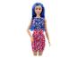 Poupée Barbie avec une robe bleue à thème scientifique.
