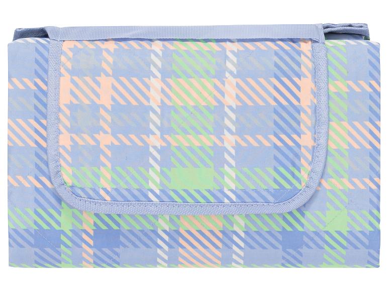 Couverture de pique-nique pliante à motif vichy pastel.