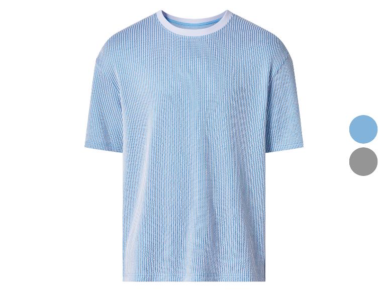 T-shirt à manches courtes rayé bleu et blanc avec col rond.