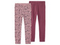 Deux leggings: un à fleurs et un uni rose.