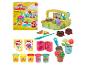 Kit Play-Doh 'Fleurs épanouies' avec pâte à modeler, outils et pots de fleurs.