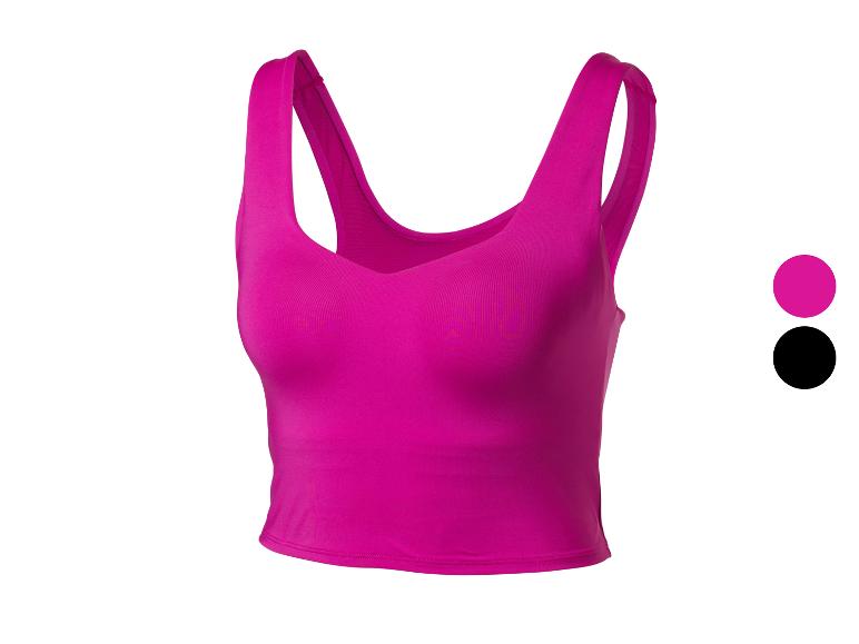 Crop top de sport fuchsia à larges bretelles, disponible en fuchsia et noir.