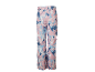 Pantalon de ski avec motif abstrait rose, bleu et blanc.
