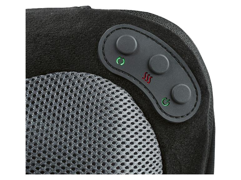 Gros plan d'un coussin de massage noir avec boutons de commande et tissu maillé.