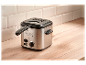 Friteuse SilverCrest sur un comptoir en bois.