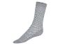 Chaussette grise avec un motif géométrique blanc.