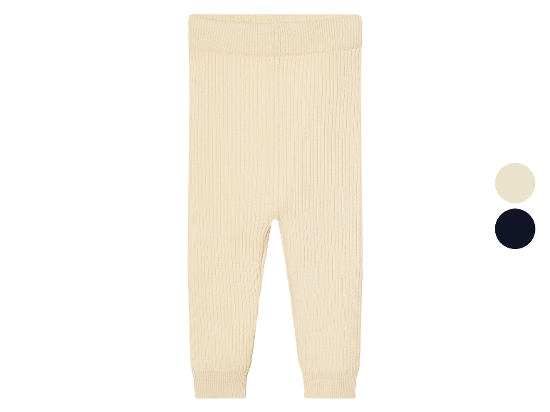 Leggings bébé en tricot beige.
