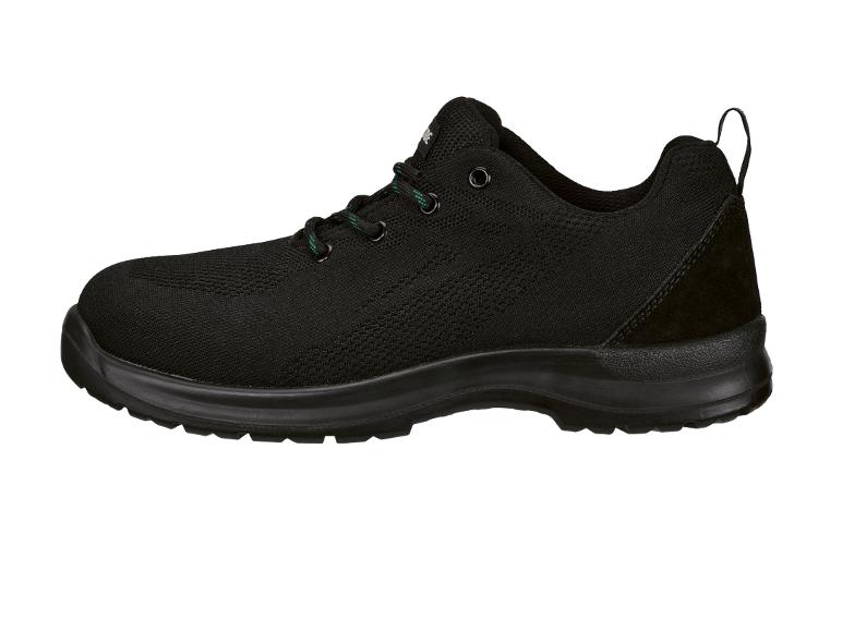 Chaussure de sécurité noire avec lacets verts et tige en maille texturée.
