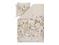 Parure de lit beige avec motif floral.