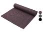 Un tapis de yoga violet de la marque Fittersport, roulé.