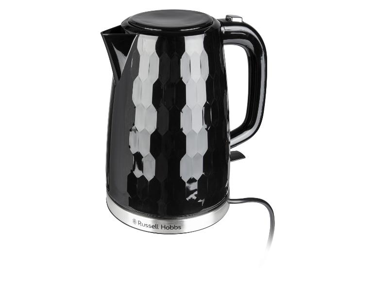 Une bouilloire noire Russell Hobbs avec un motif en nid d'abeille.