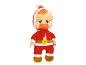 Une poupée de bébé en costume de Père Noël rouge avec une sucette.