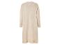 Cardigan en tricot beige pour femme.