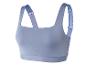 Un soutien-gorge de sport bleu avec des bretelles larges.