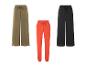 Trois pantalons amples : kaki, noir et corail.