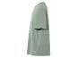 T-shirt Uniqlo vert clair, coupe ample.
