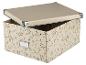 Boîte de rangement à couvercle, motif floral beige.